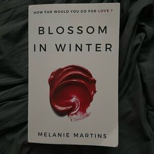 Blossom of winter and Lured into Love books by Melanie Martins.